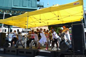 Youngsters and KR3T's dancers delight the crowd onstage at Bronx Summer Fest 2016.