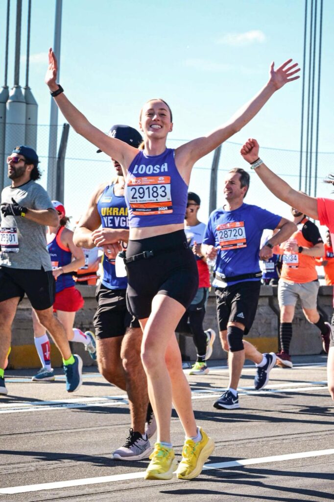 Pictured: Lucia Winton, official runner of Team WHEDco for the 2024 TCS NYC Marathon