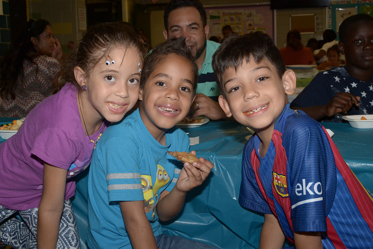 Young students at Garden of Dreams BBQ at WHEDco Summer Arts Day Camp.